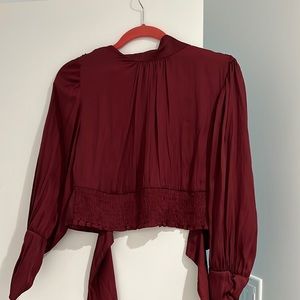 Never worn L open back shirt